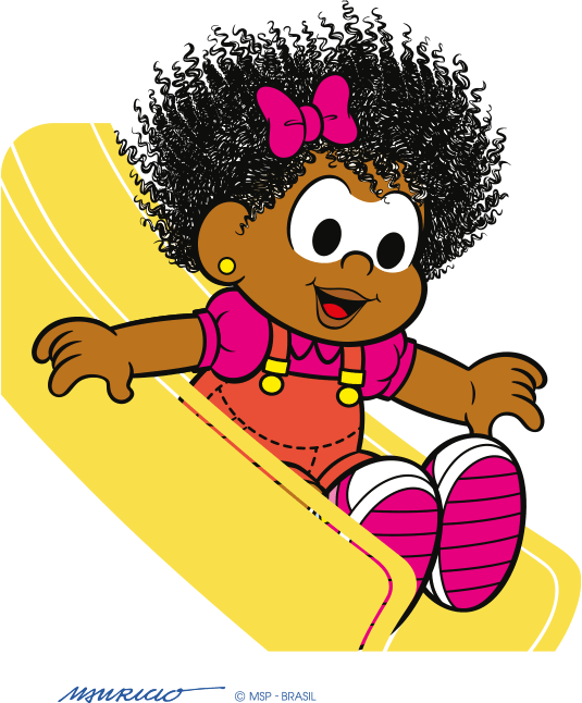 Personagem Milena de Turma da Mônica. Ela é uma garotinha negra com o cabelo preto crespo e nessa foto a sua boca está no mesmo tom marrom de sua pele. Usa uma blusa rosa e um macacão laranja e está escorregando em um escorrega amarelo.