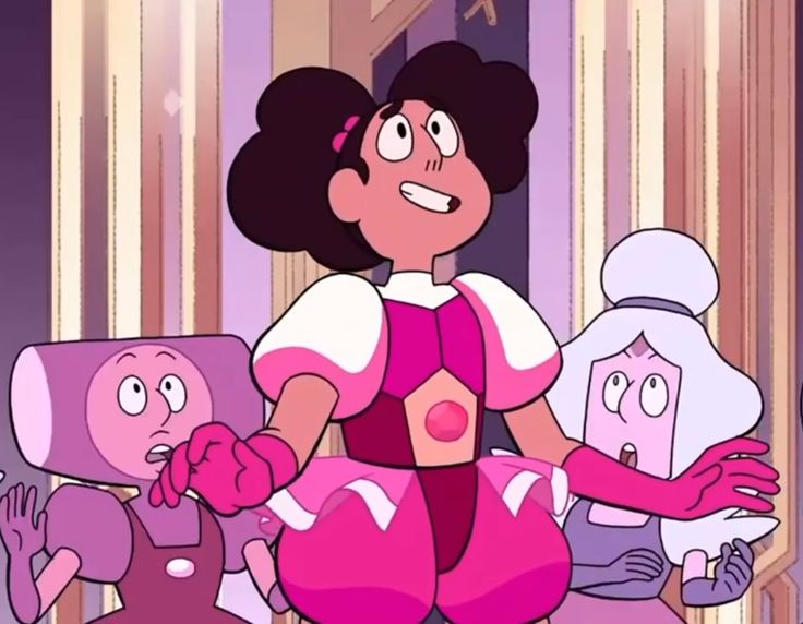 Imagem retirada de um episódio onde Stevonnie aparece. Stevonnie é uma pessoa alta, de pele clara e cabelos castanhos ondulados, que se encontram presos. Suas roupas estão em uma paleta monocromática de rosa, com alguns detalhes em branco nas mangas, babados e pescoço.