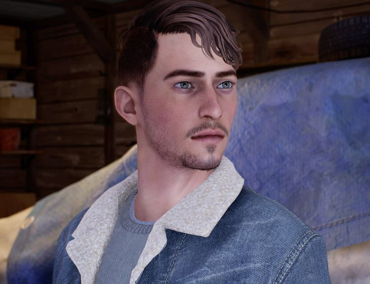 Na imagem, um personagem de pele clara, olhos azuis, barba rala e cabelos castanhos se porta com uma expressão pensativa. Ele está vestindo uma jaqueta jeans com gola de lã clara e camiseta cinza por baixo. Ao fundo, um cenário em madeira e uma lona azul que cobre o que parece ser um carro.